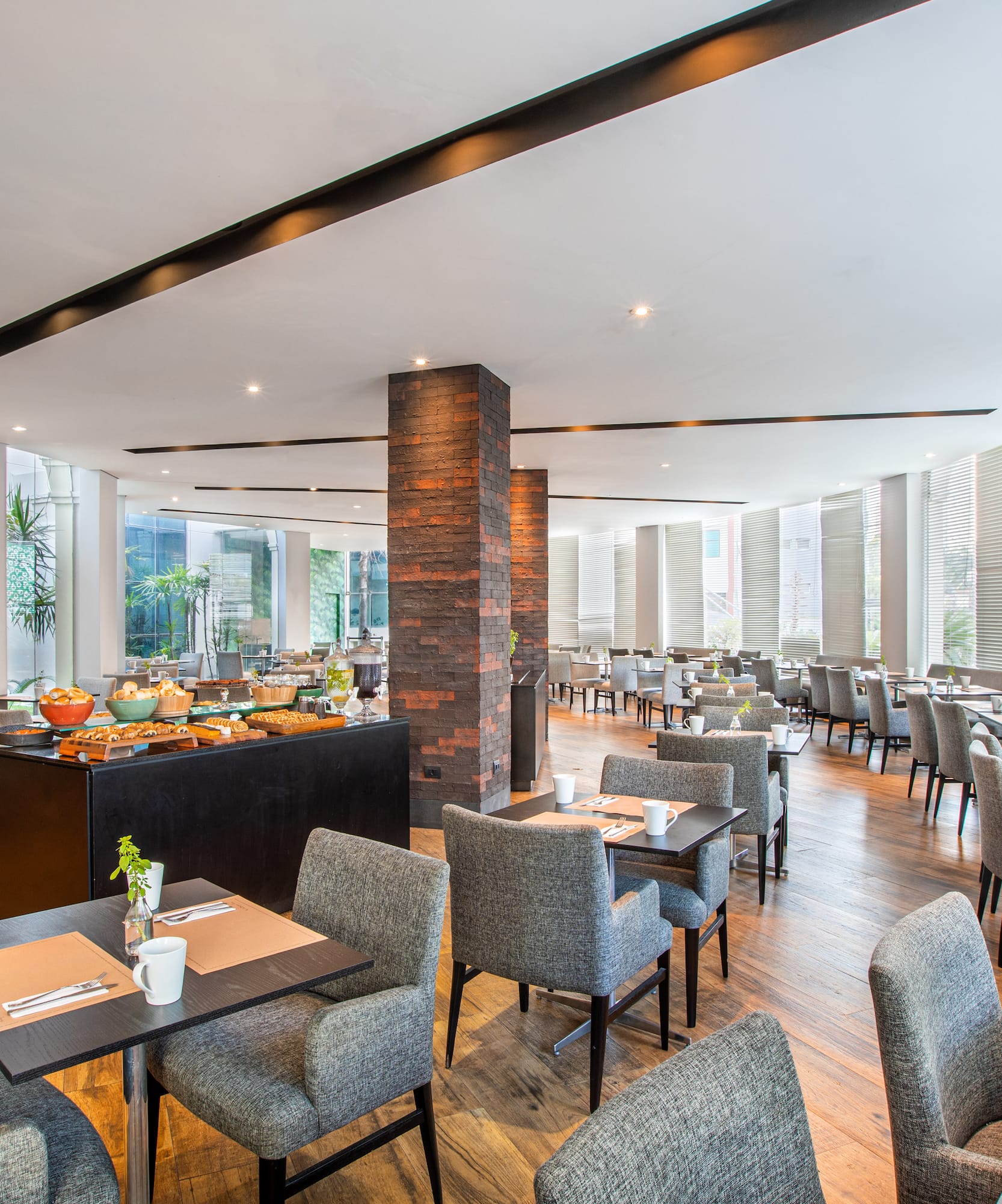 a restaurant with tables and chairs