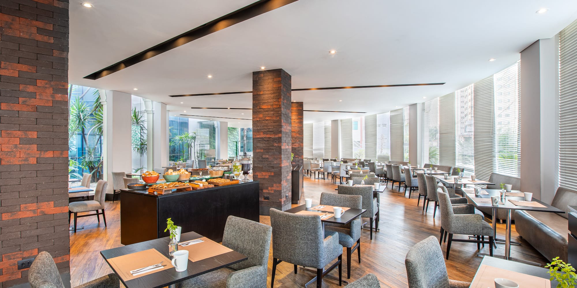 a restaurant with tables and chairs