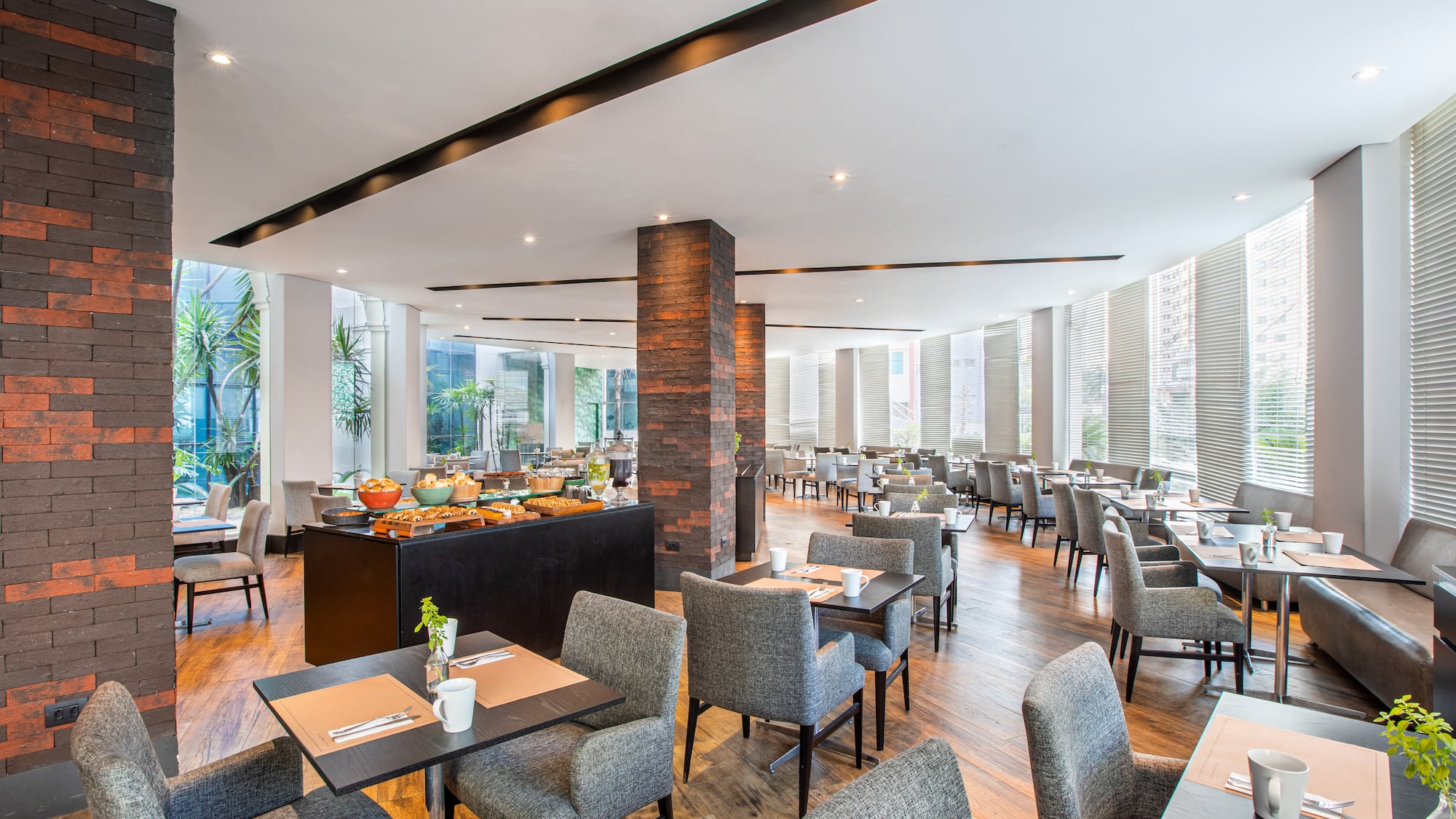 a restaurant with tables and chairs