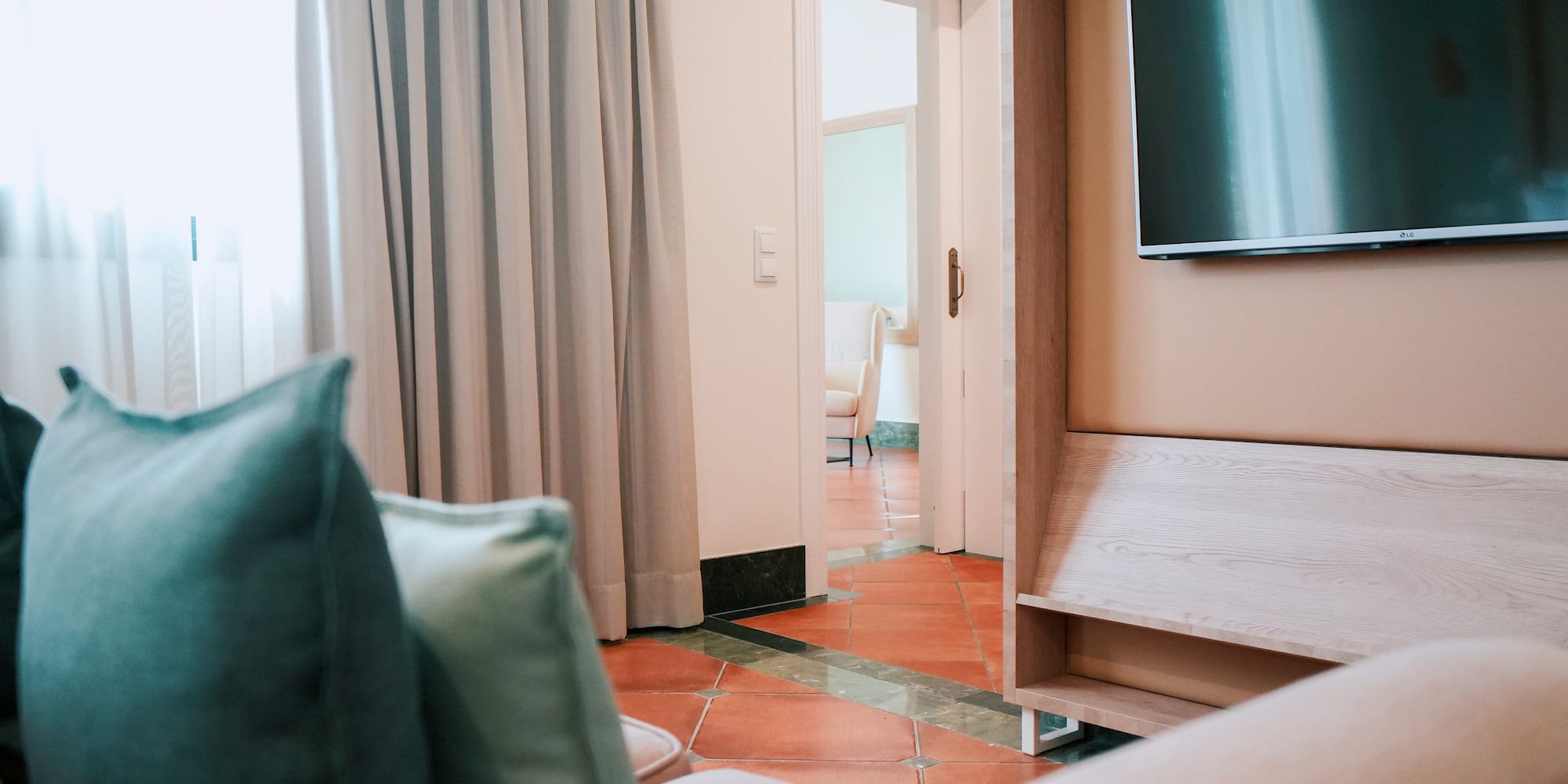 a room with a tv and a couch