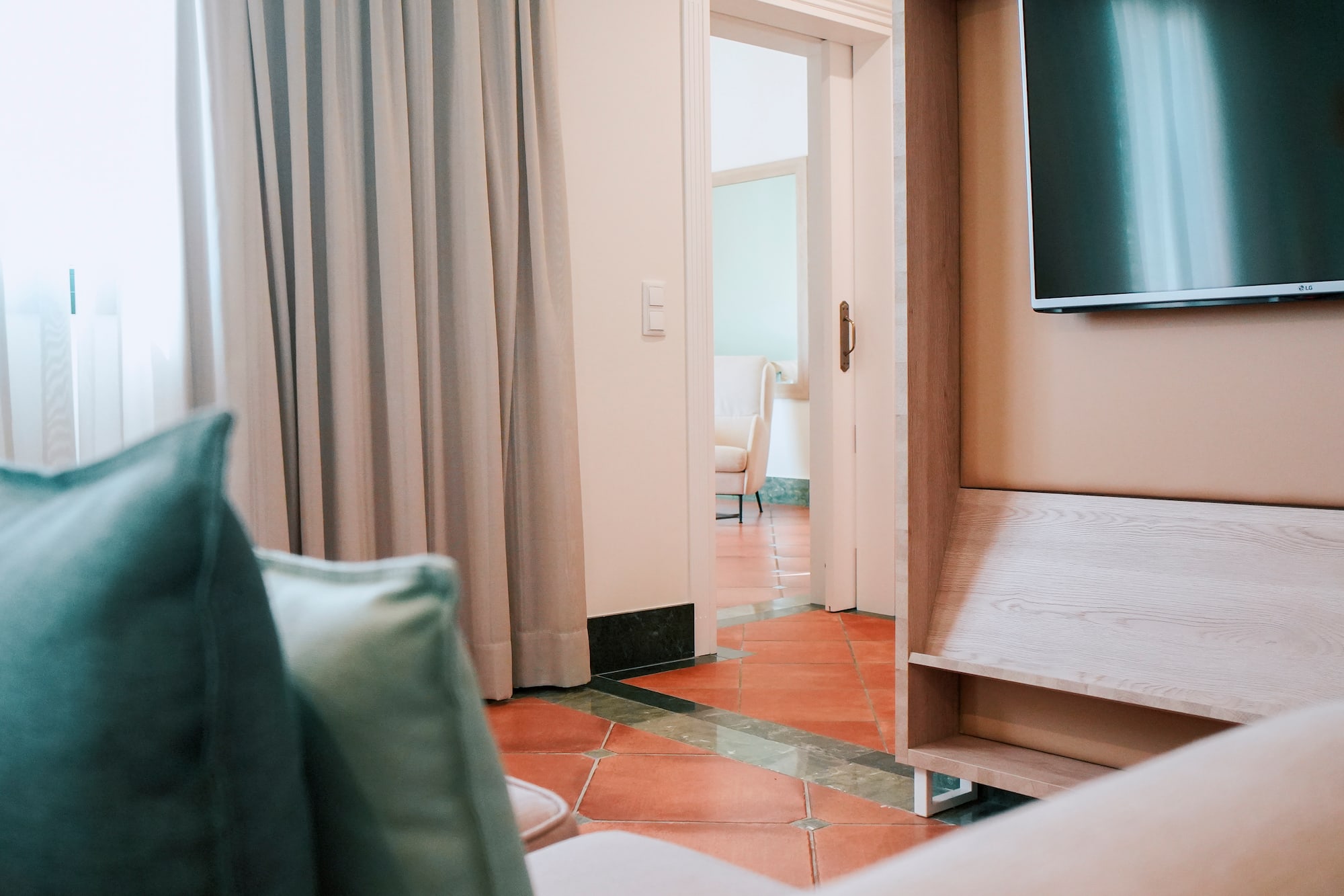 a room with a tv and a couch