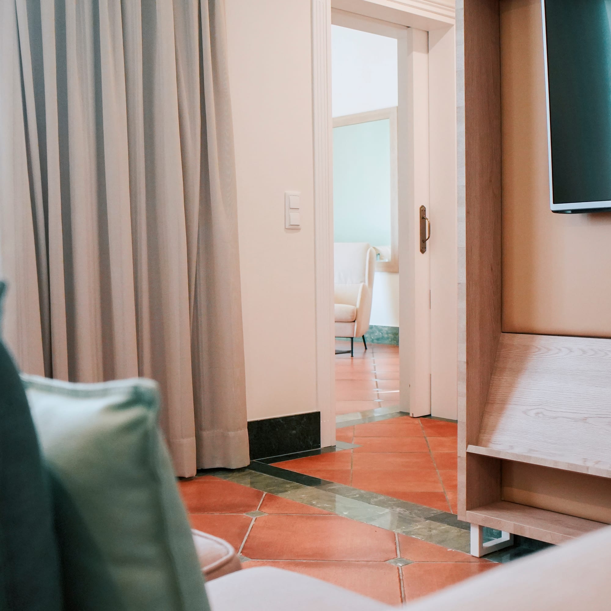 a room with a tv and a couch