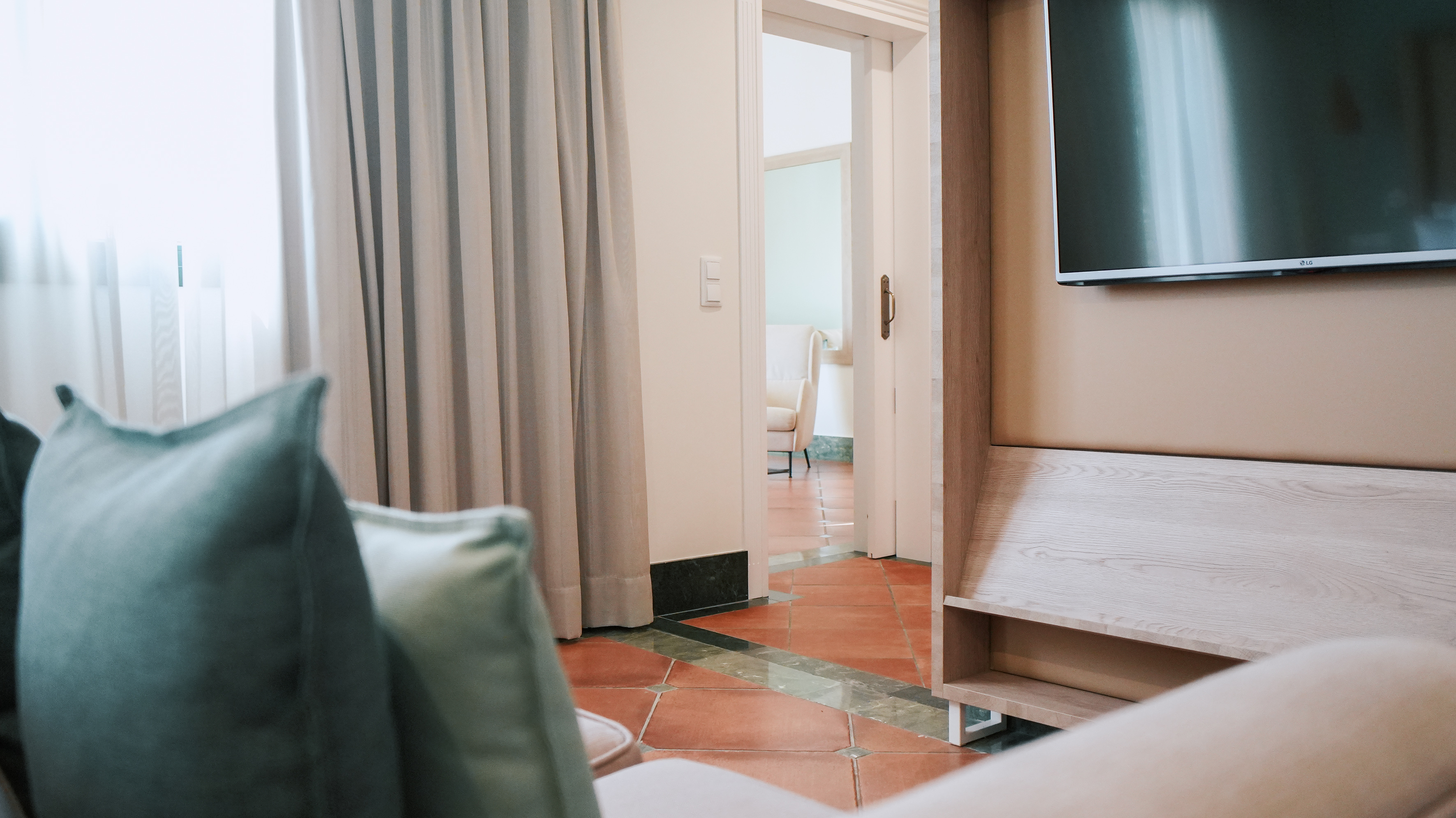 a room with a tv and a couch