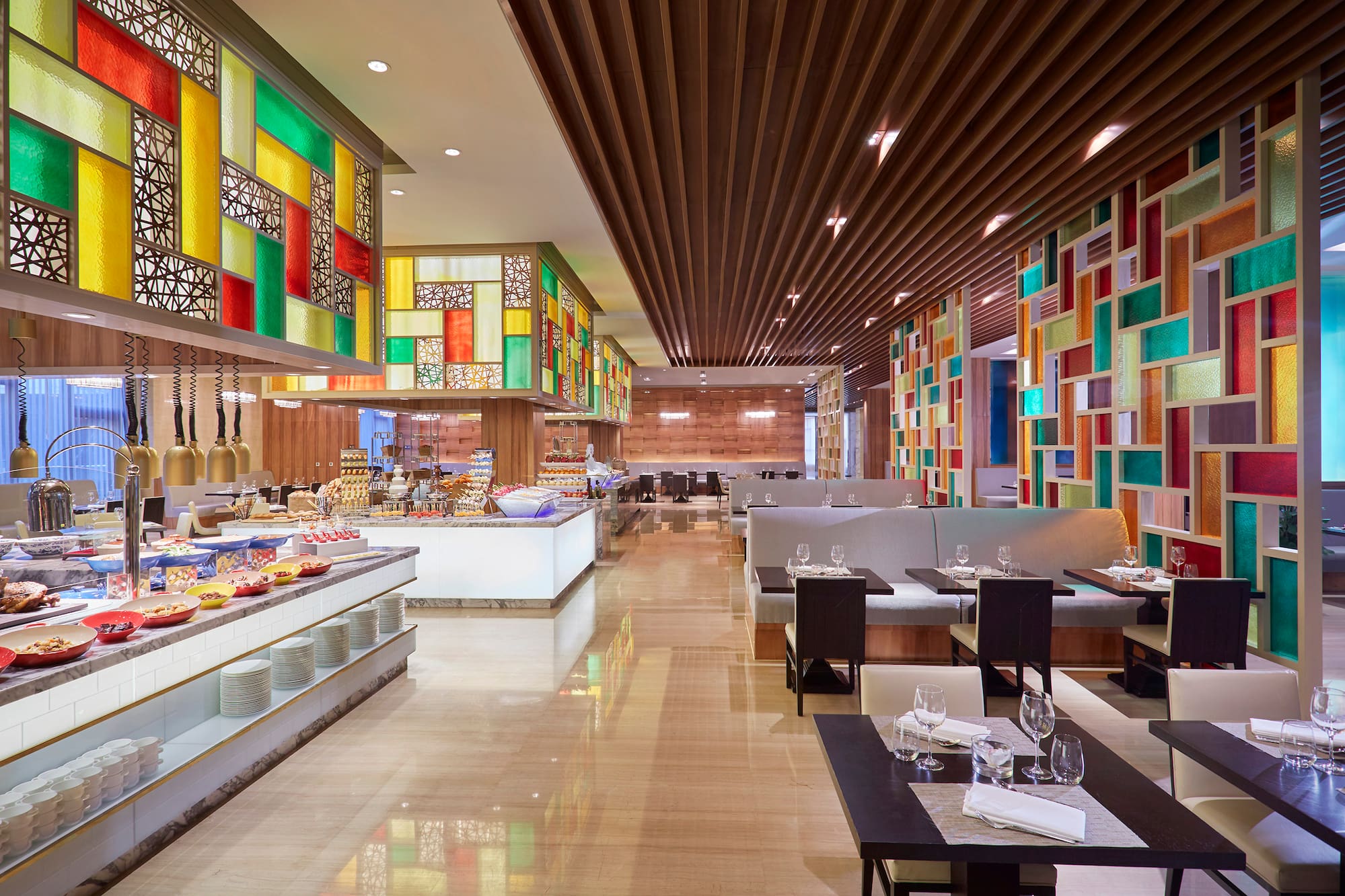 a restaurant with colorful walls and tables