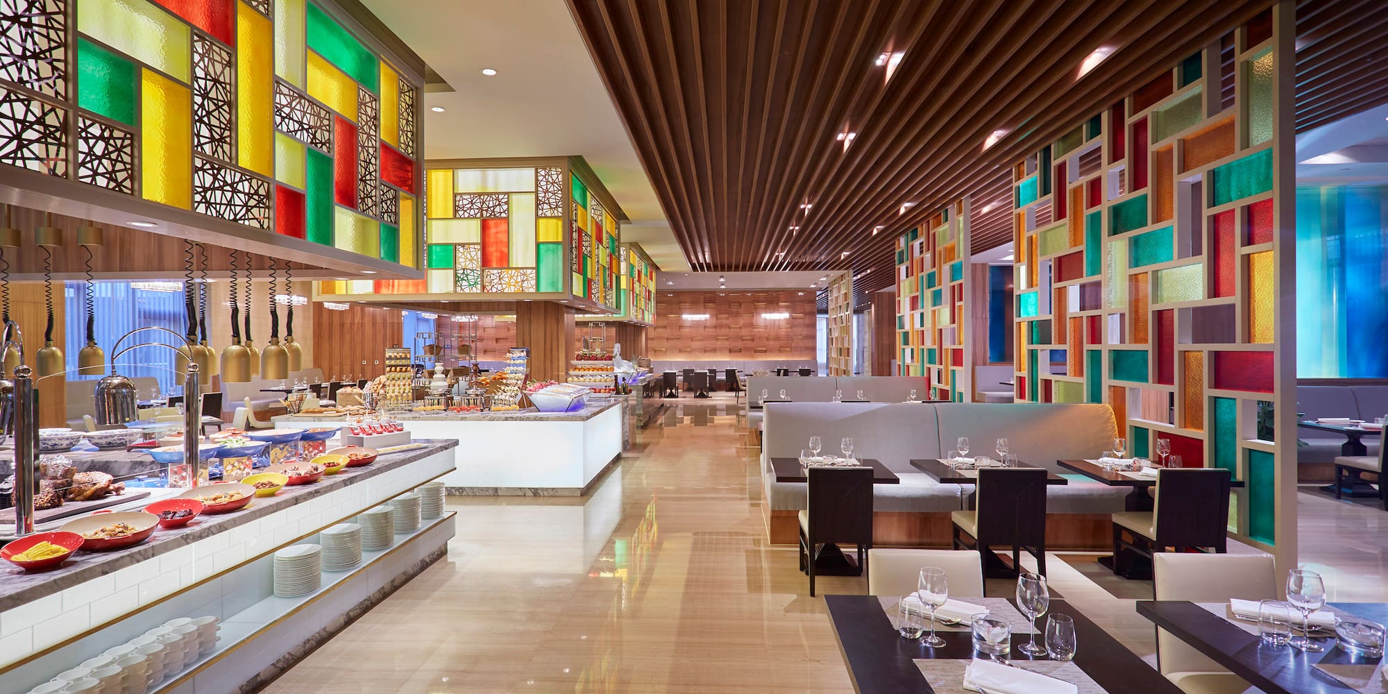 a restaurant with colorful walls and tables