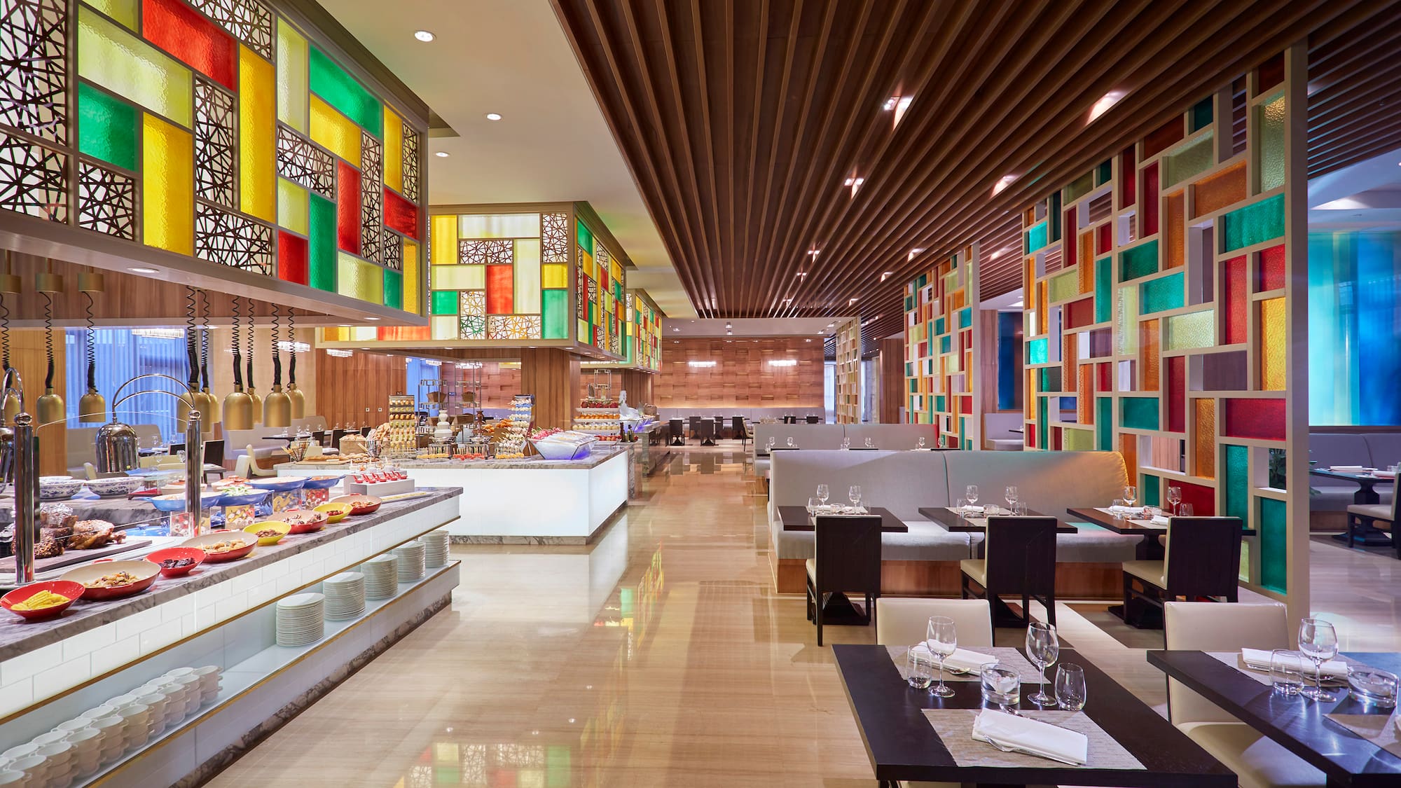 a restaurant with colorful walls and tables