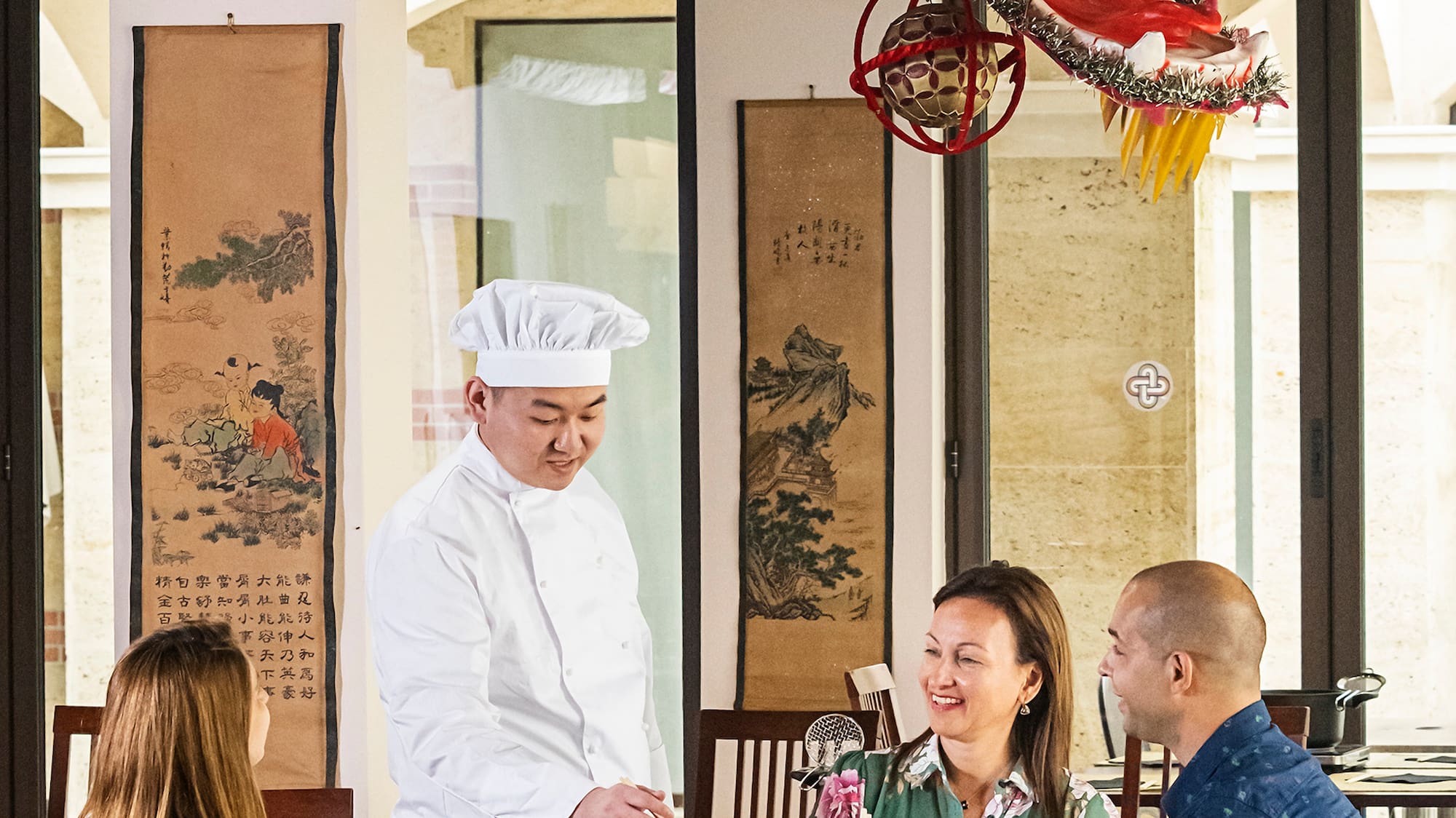 a group of people sitting at a table