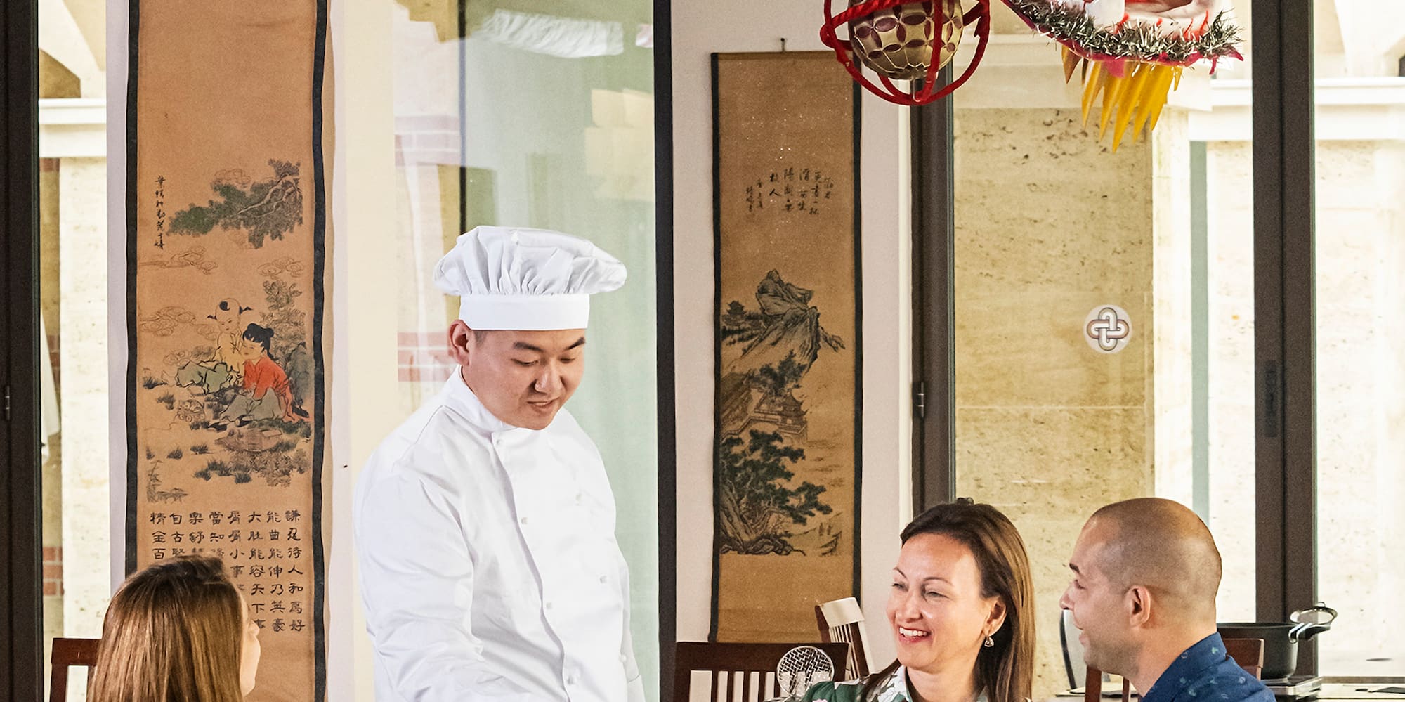 a group of people sitting at a table