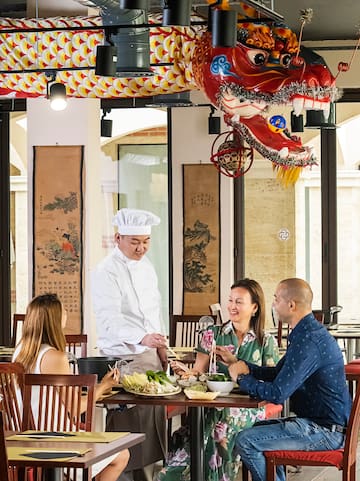 a group of people sitting at a table