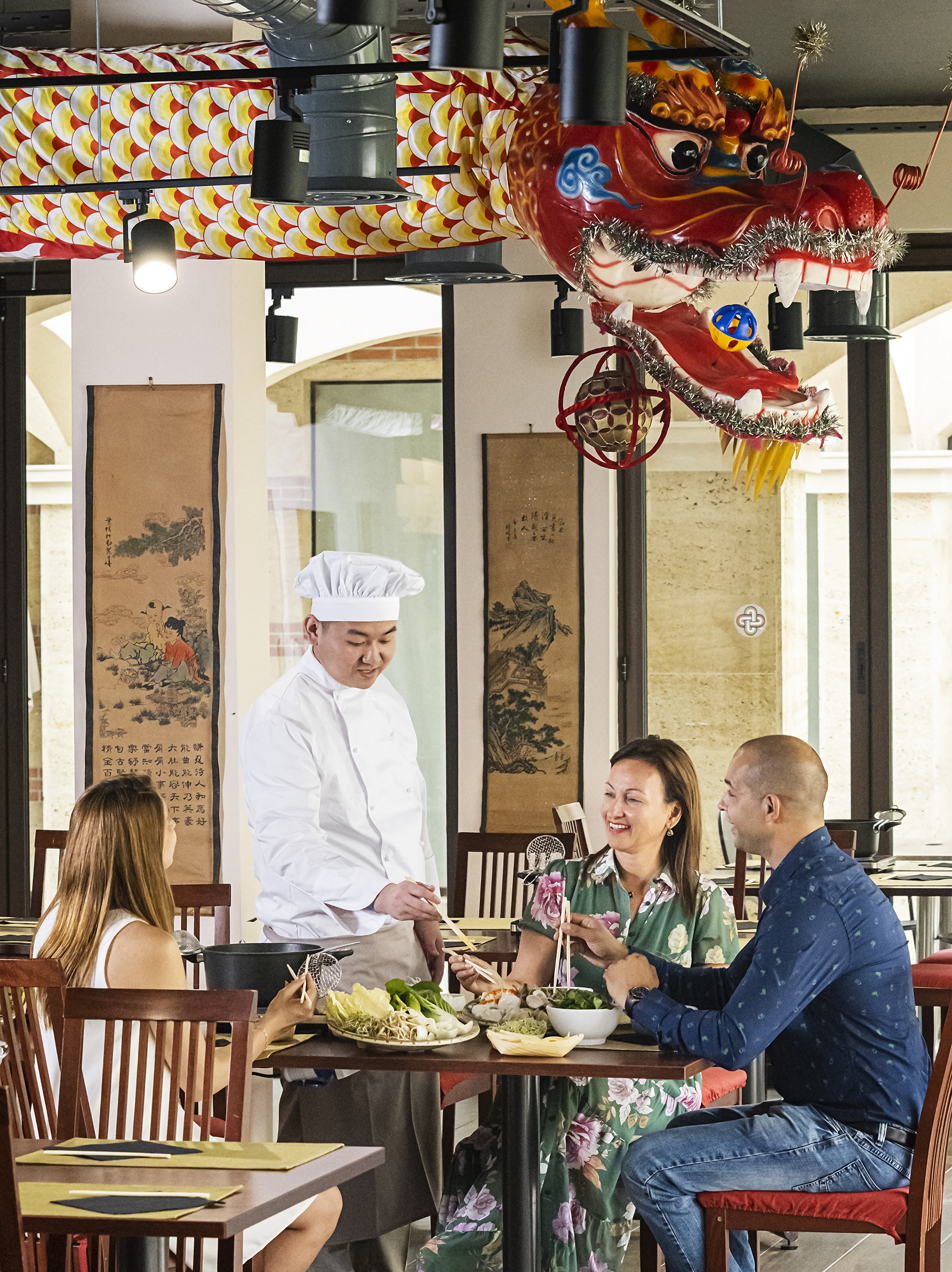 a group of people sitting at a table