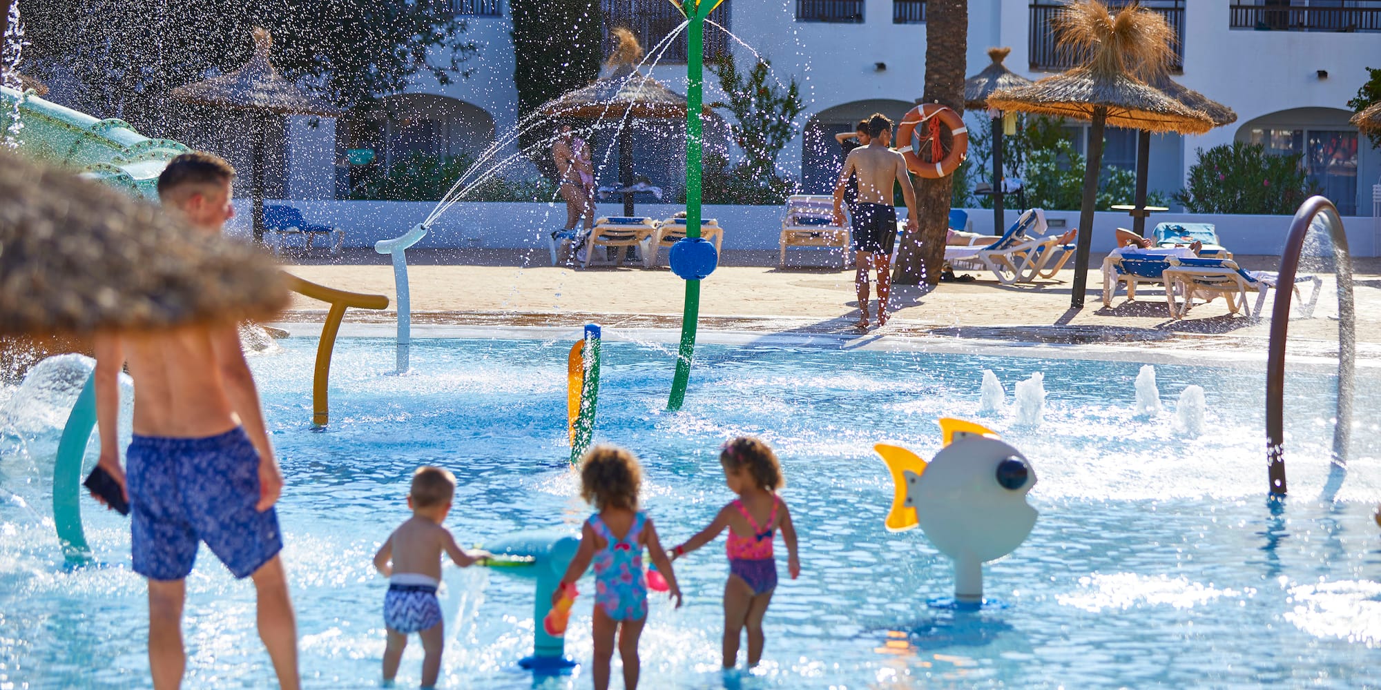 a group of kids in a pool