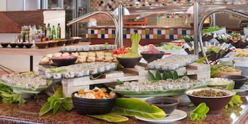 a buffet table with different food items
