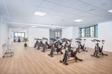 a room with exercise bikes