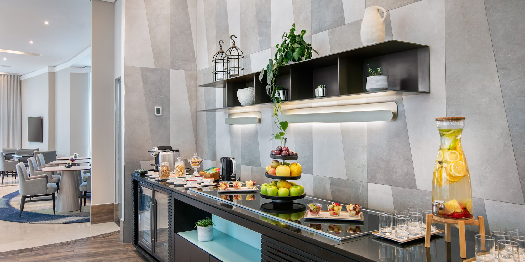 a table with plates of food and coffee