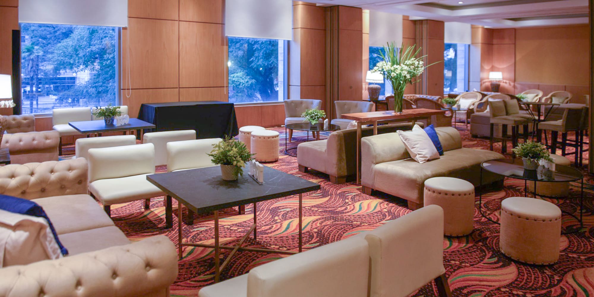 a room with couches and tables