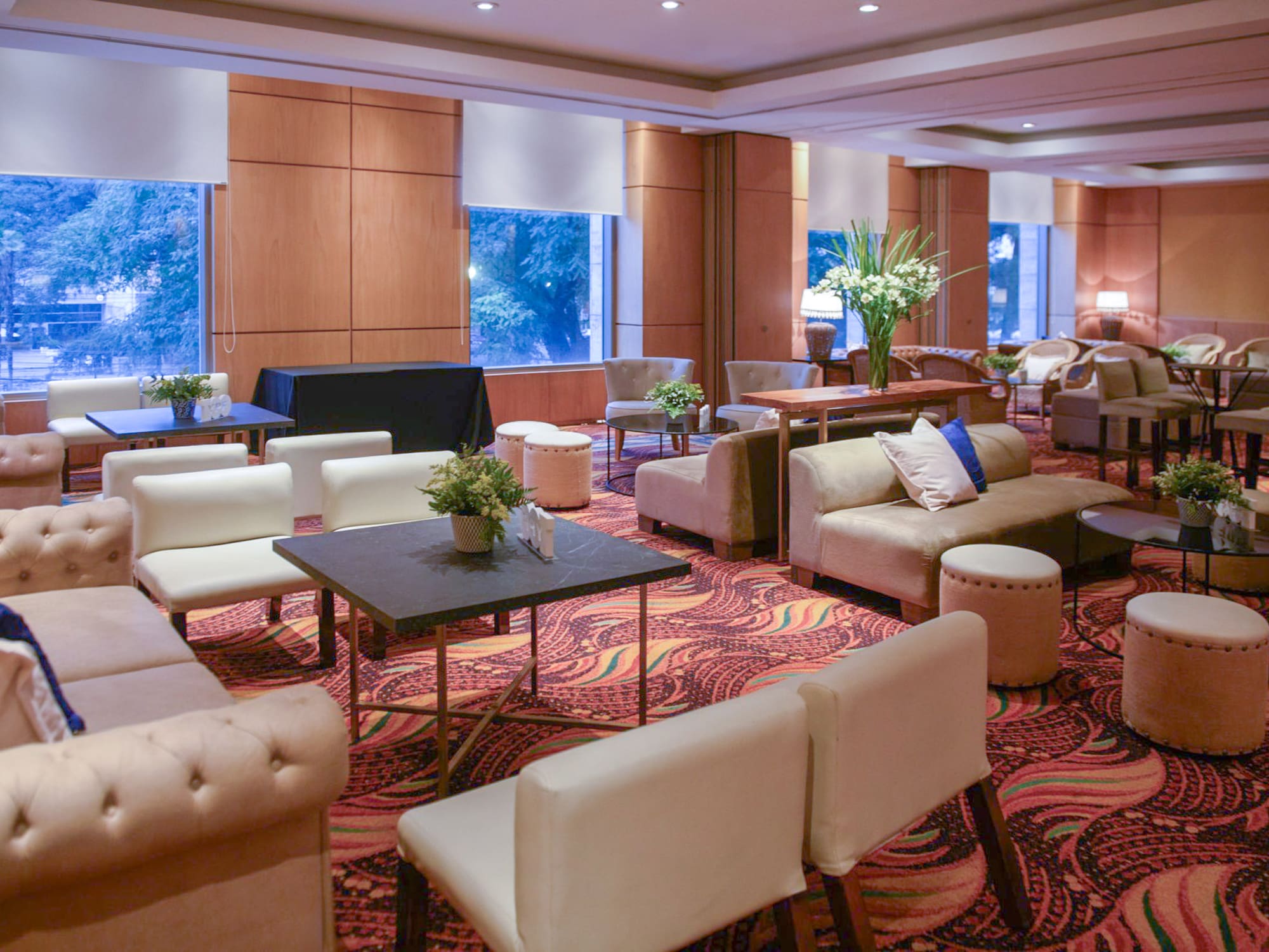 a room with couches and tables