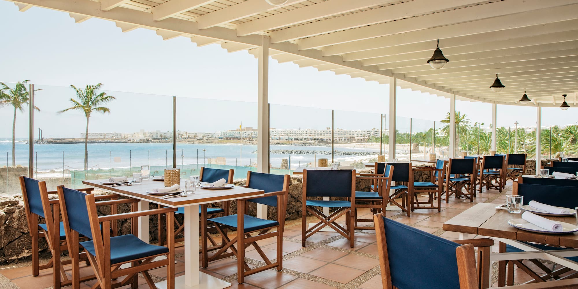 a restaurant with tables and chairs