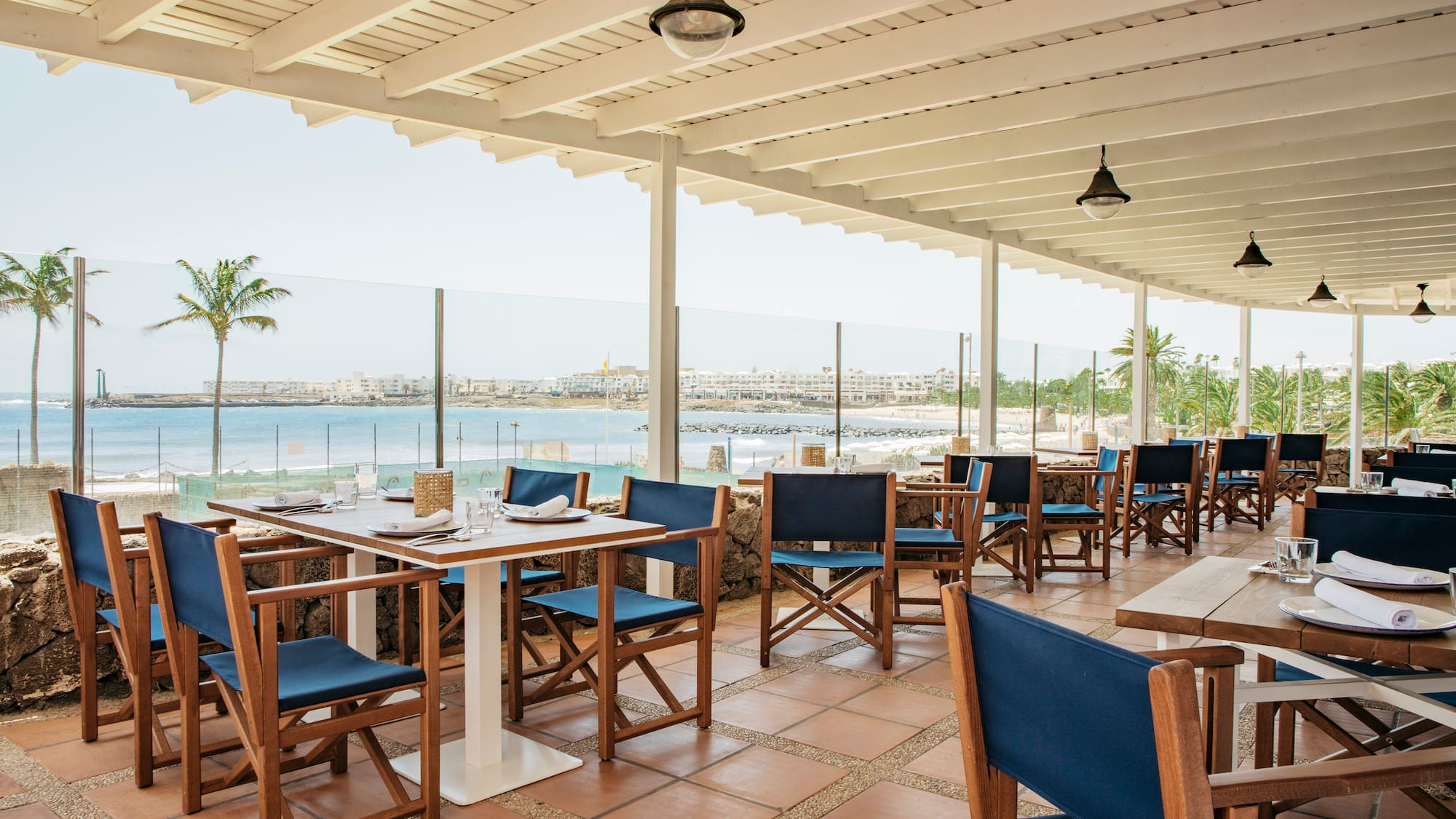 a restaurant with tables and chairs