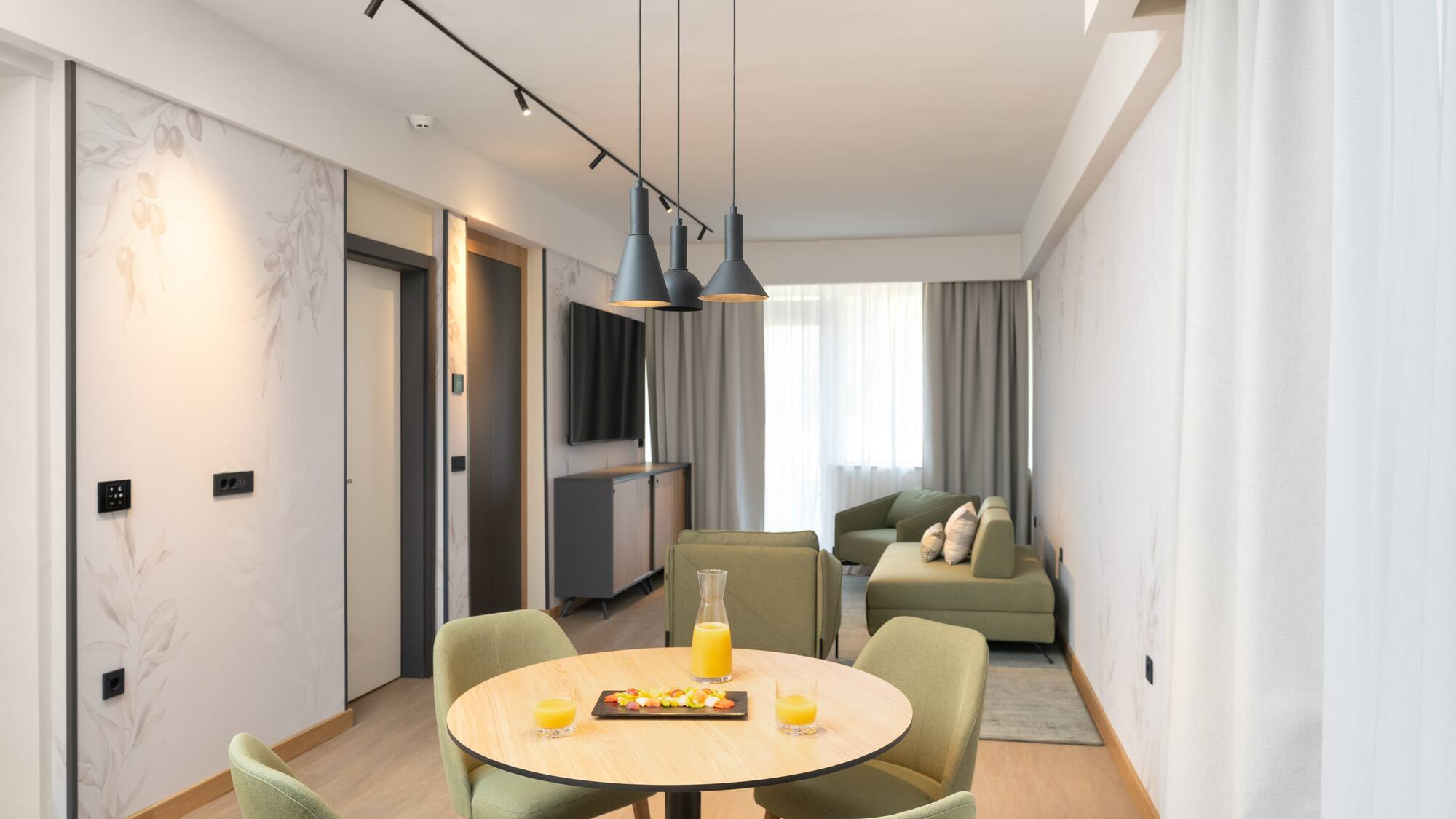 a room with a table and chairs