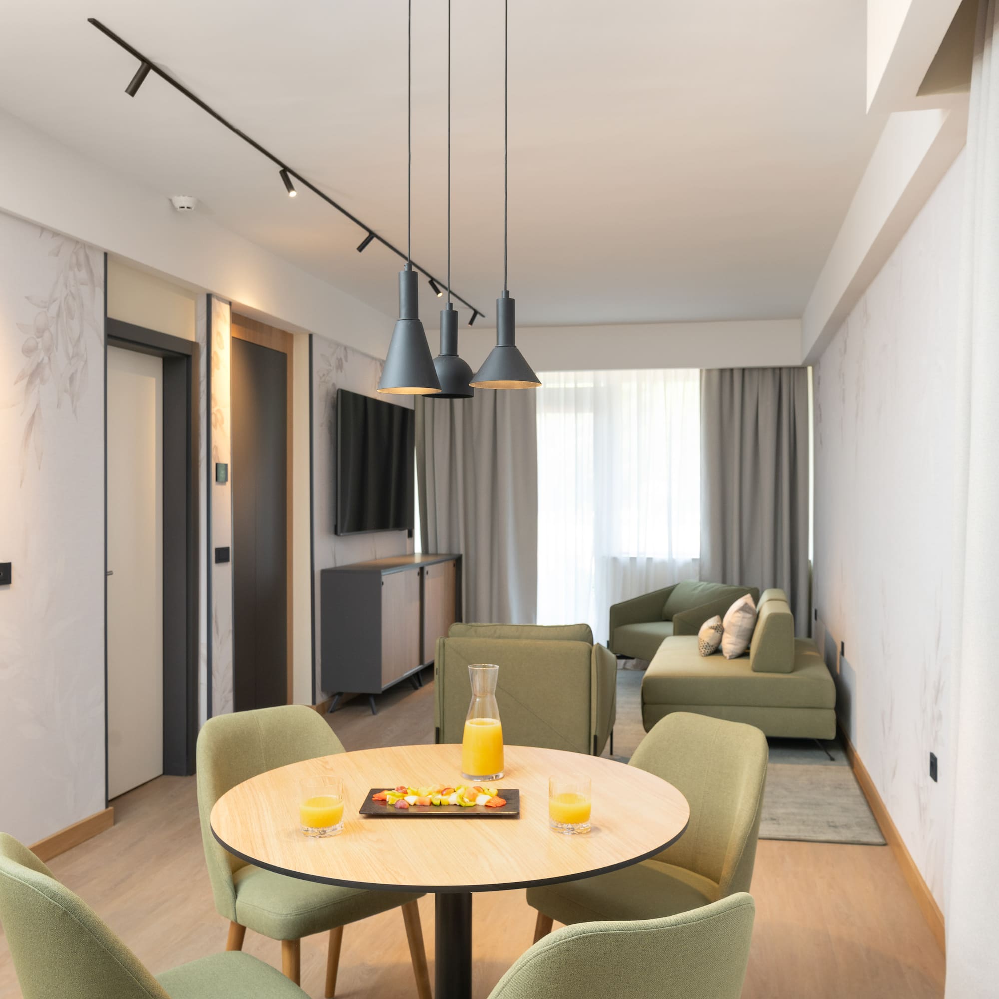 a room with a table and chairs