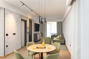 a room with a table and chairs