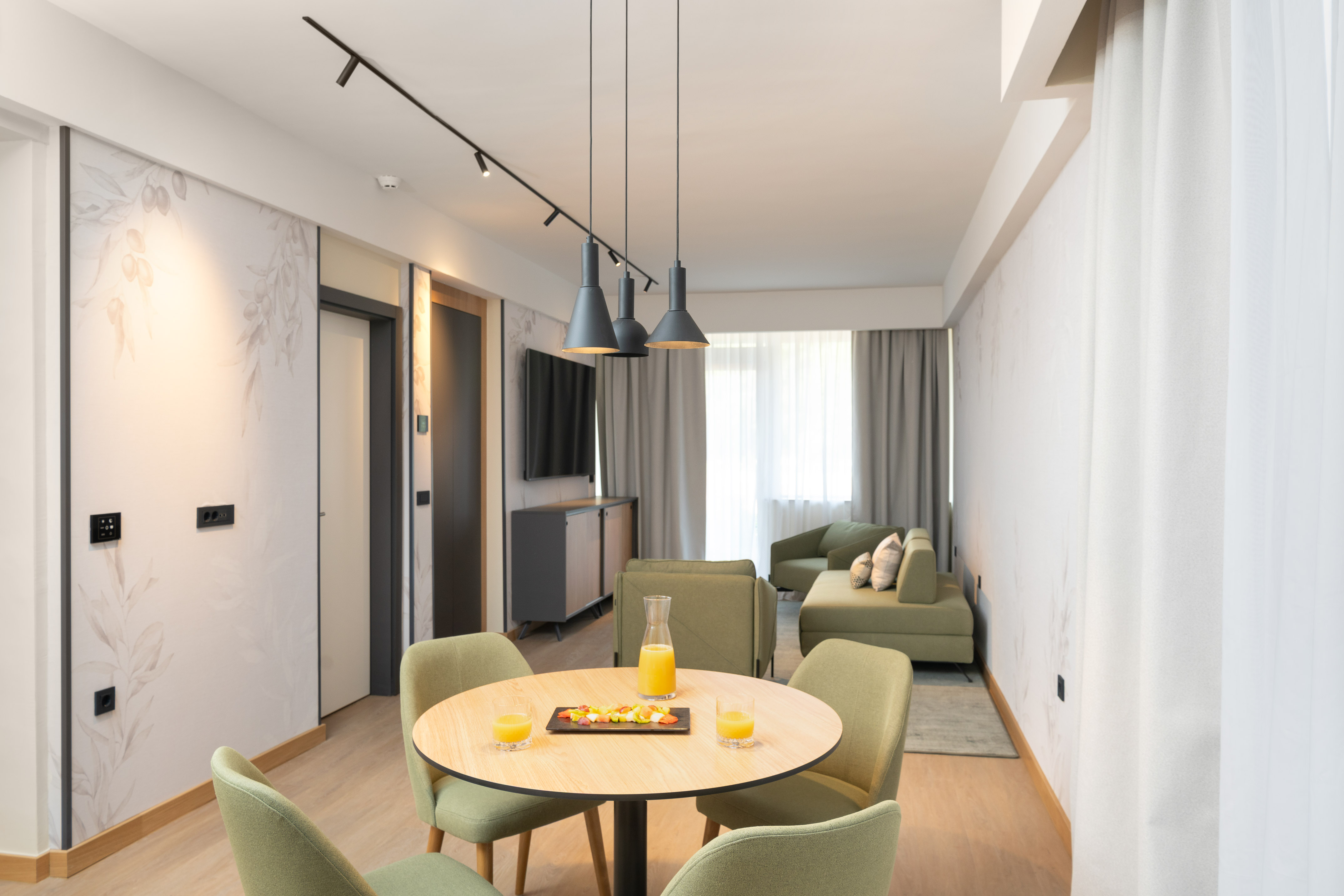 a room with a table and chairs