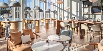 a room with tables and chairs