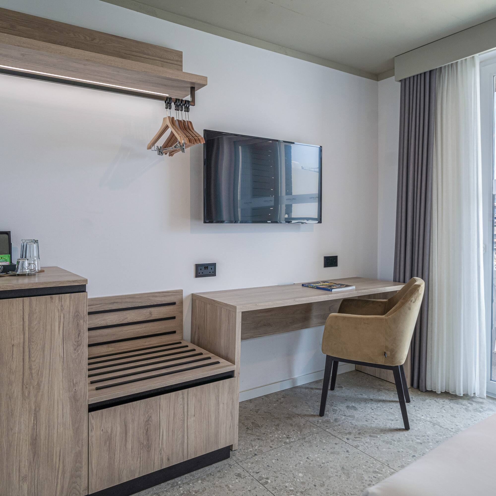 a room with a television and a table