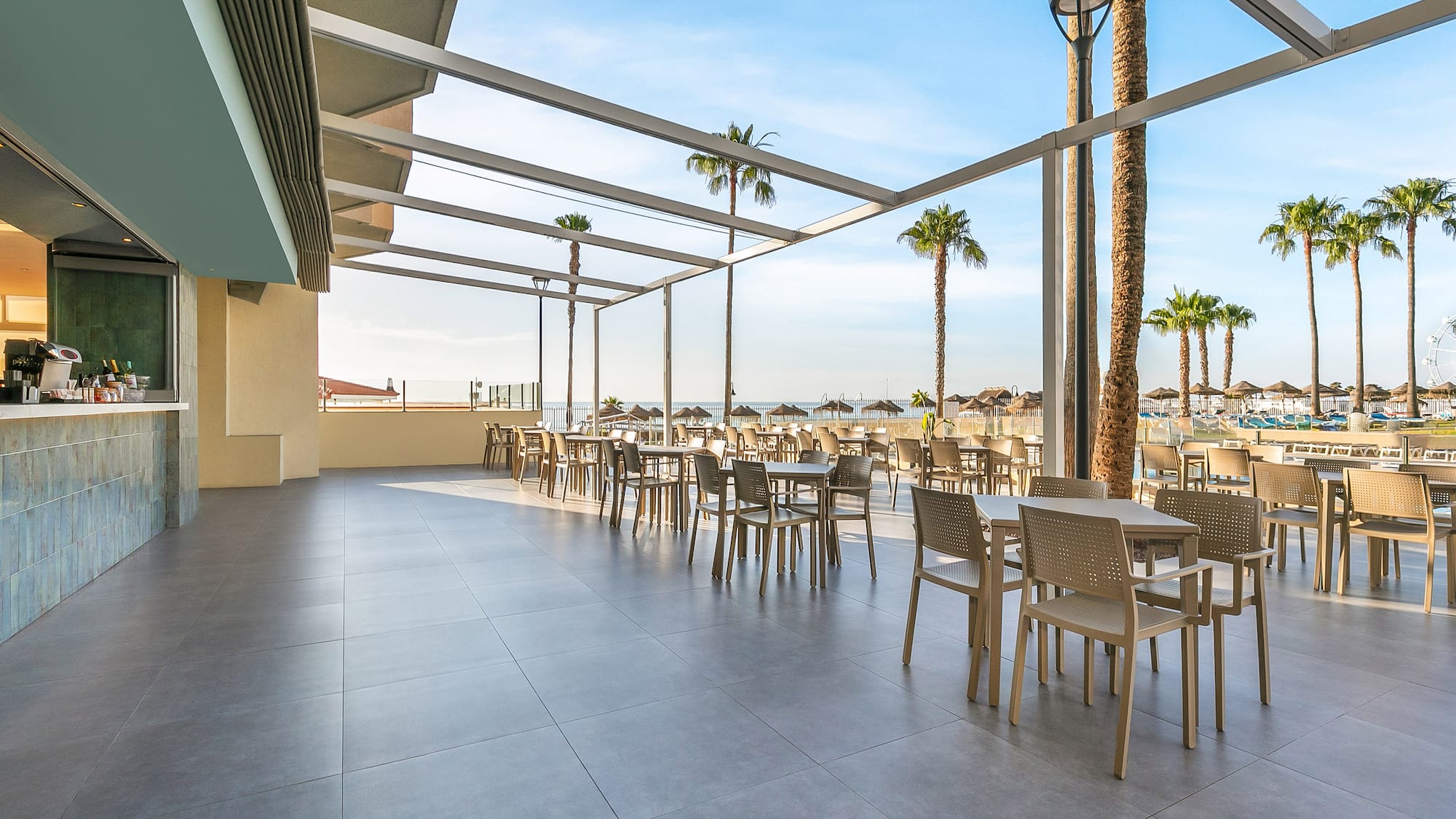 a patio with tables and chairs