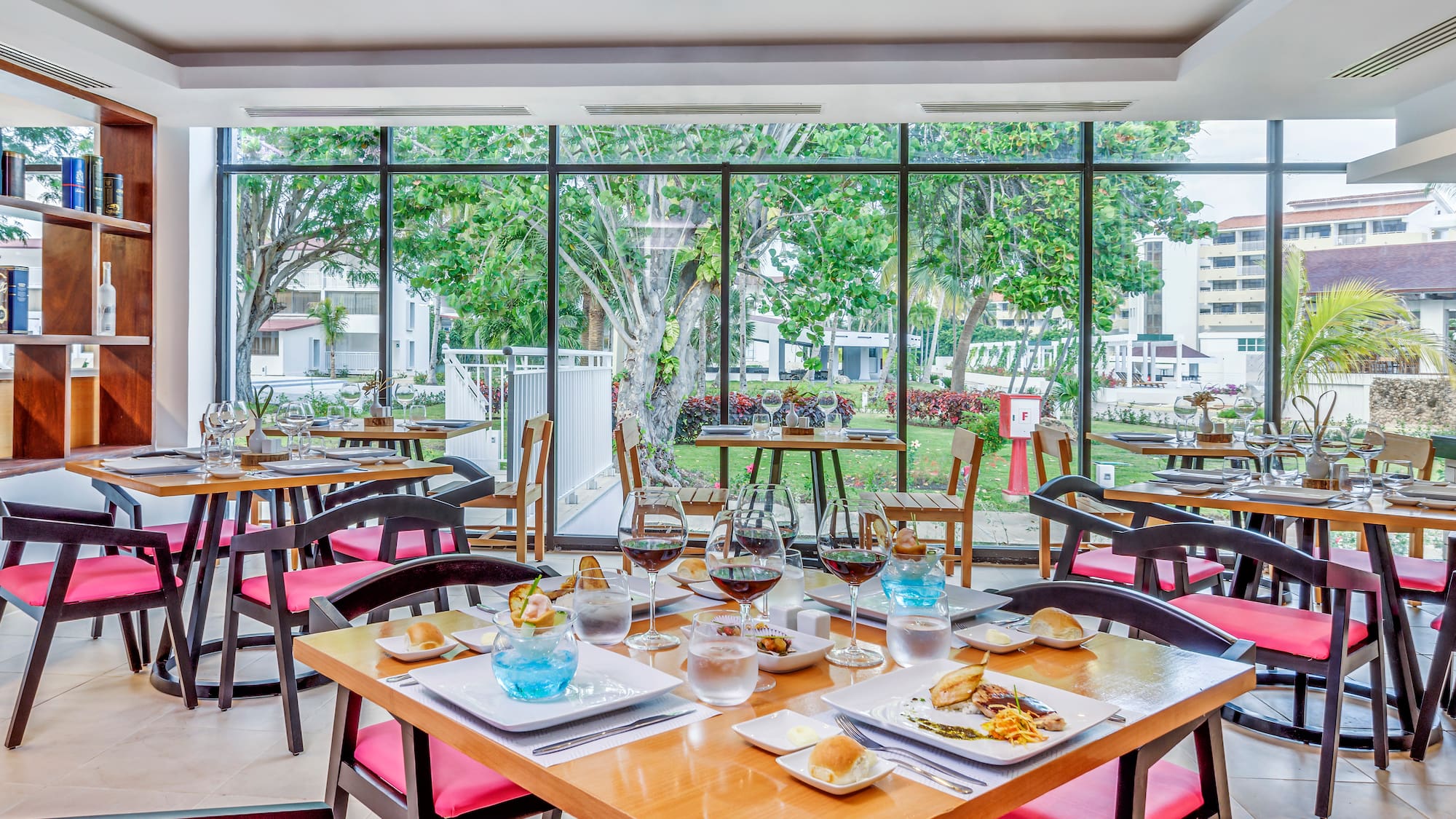 a restaurant with tables and chairs