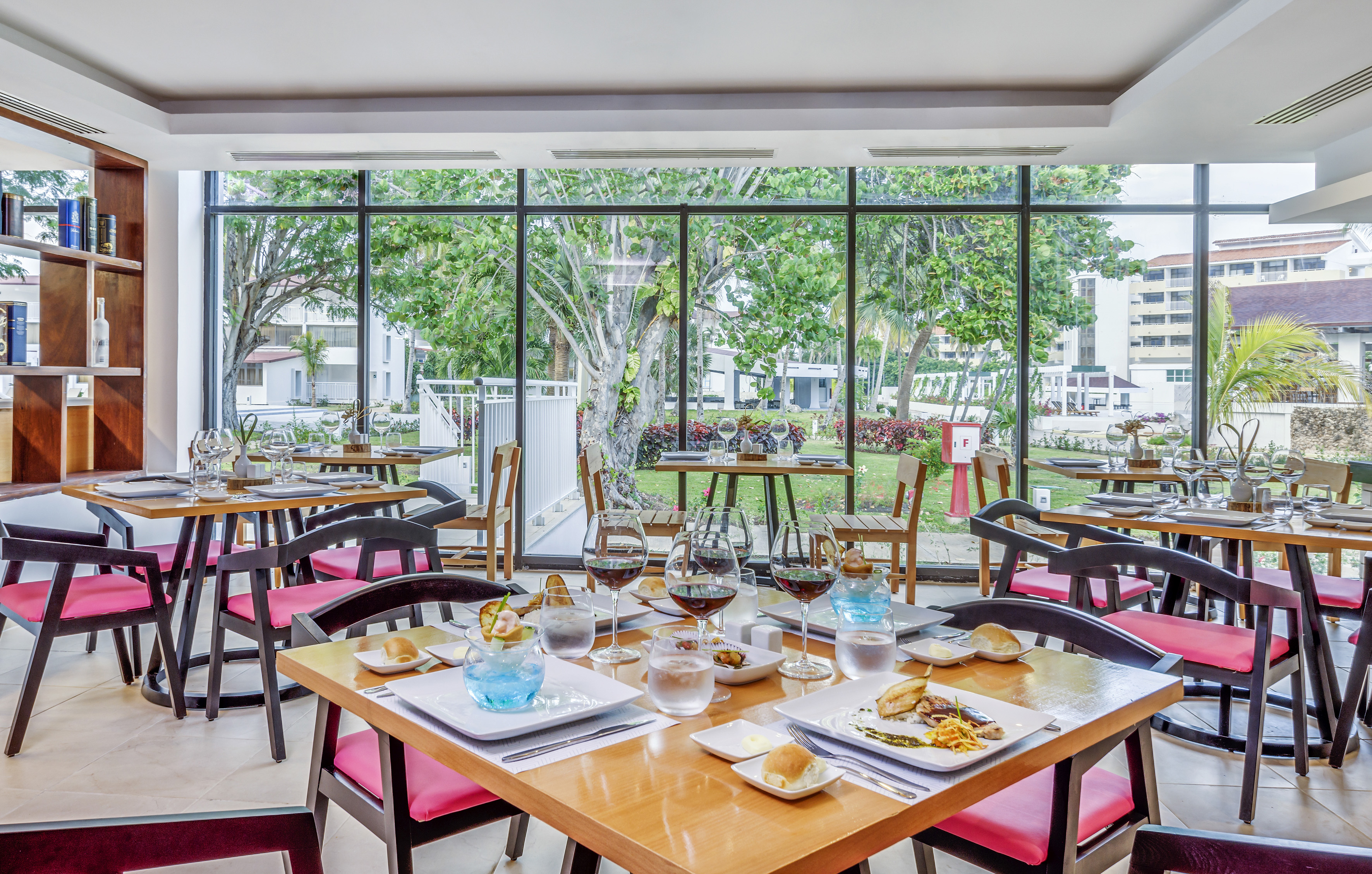 a restaurant with tables and chairs