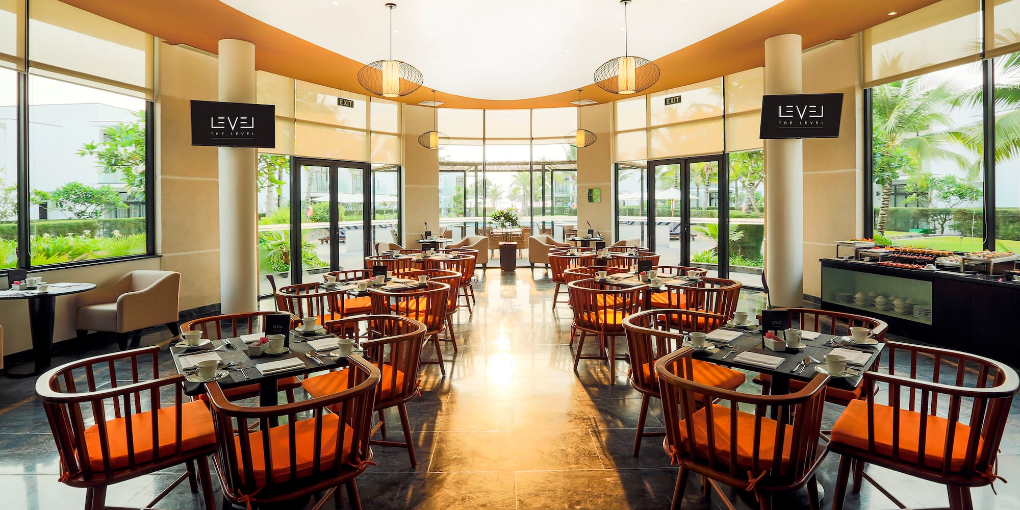 a restaurant with tables and chairs