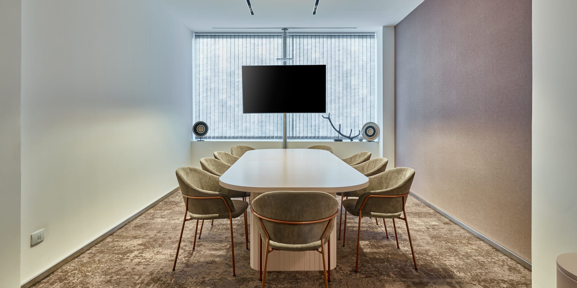 a room with a table and chairs