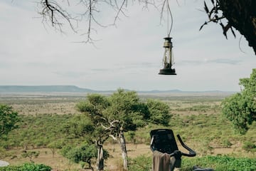 an exercise bike on a patio with a view of a landscape
