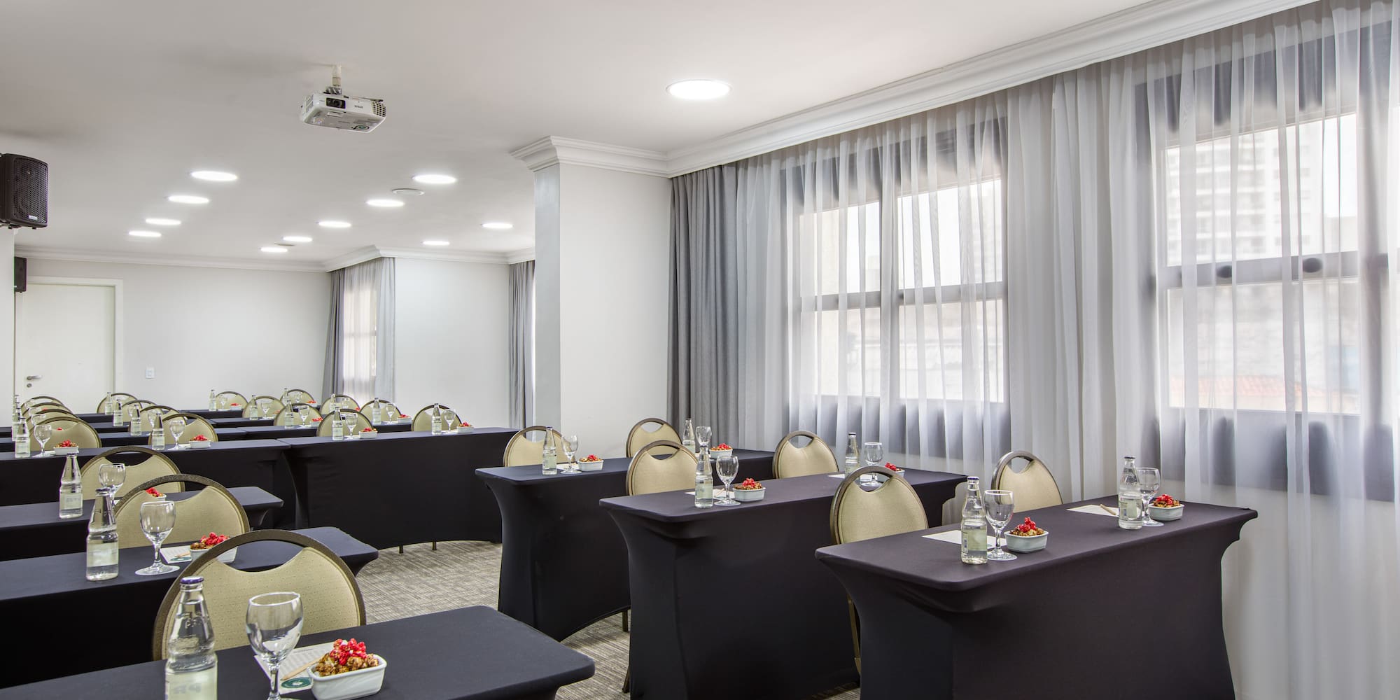 a room with tables and chairs