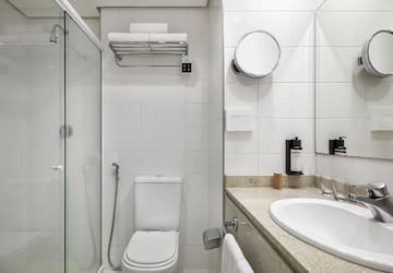 a bathroom with a sink and toilet