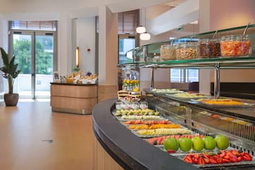 a buffet with different foods on it