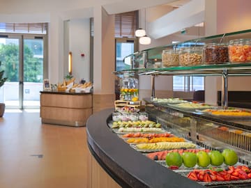 a buffet with different foods on it