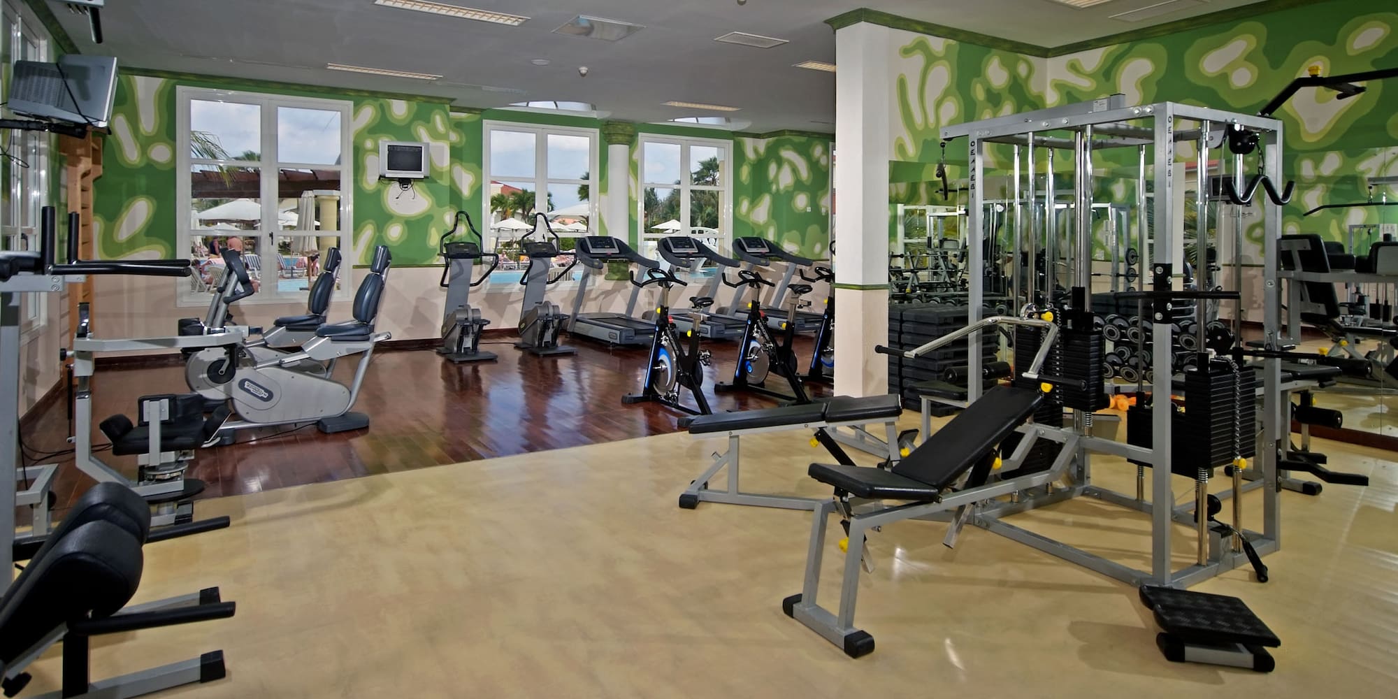 a large room with exercise equipment