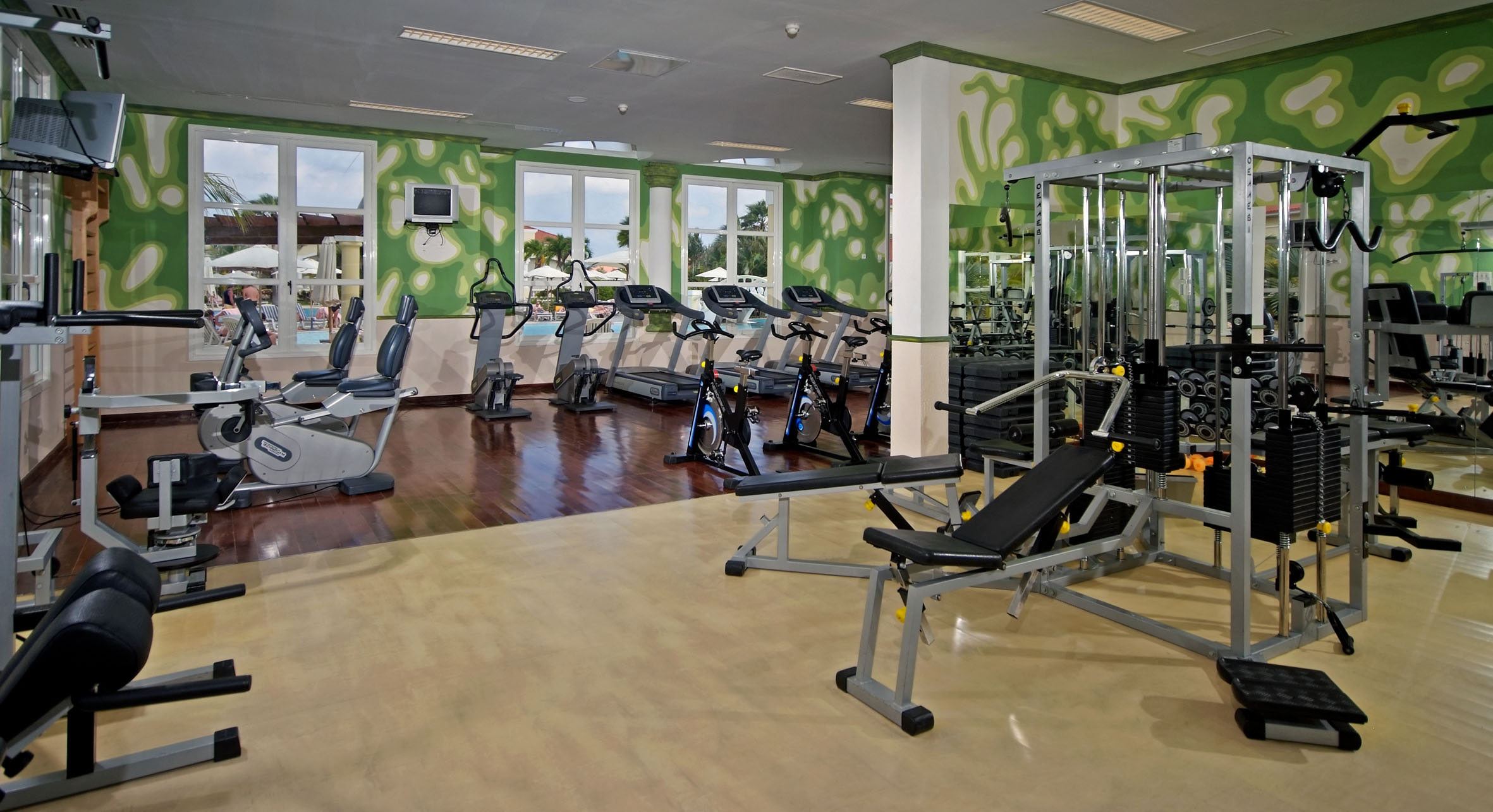 a large room with exercise equipment