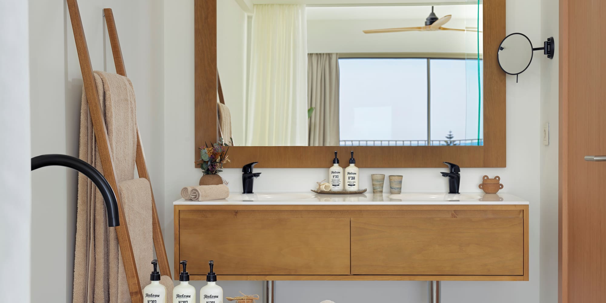 a bathroom with a bathtub and a mirror