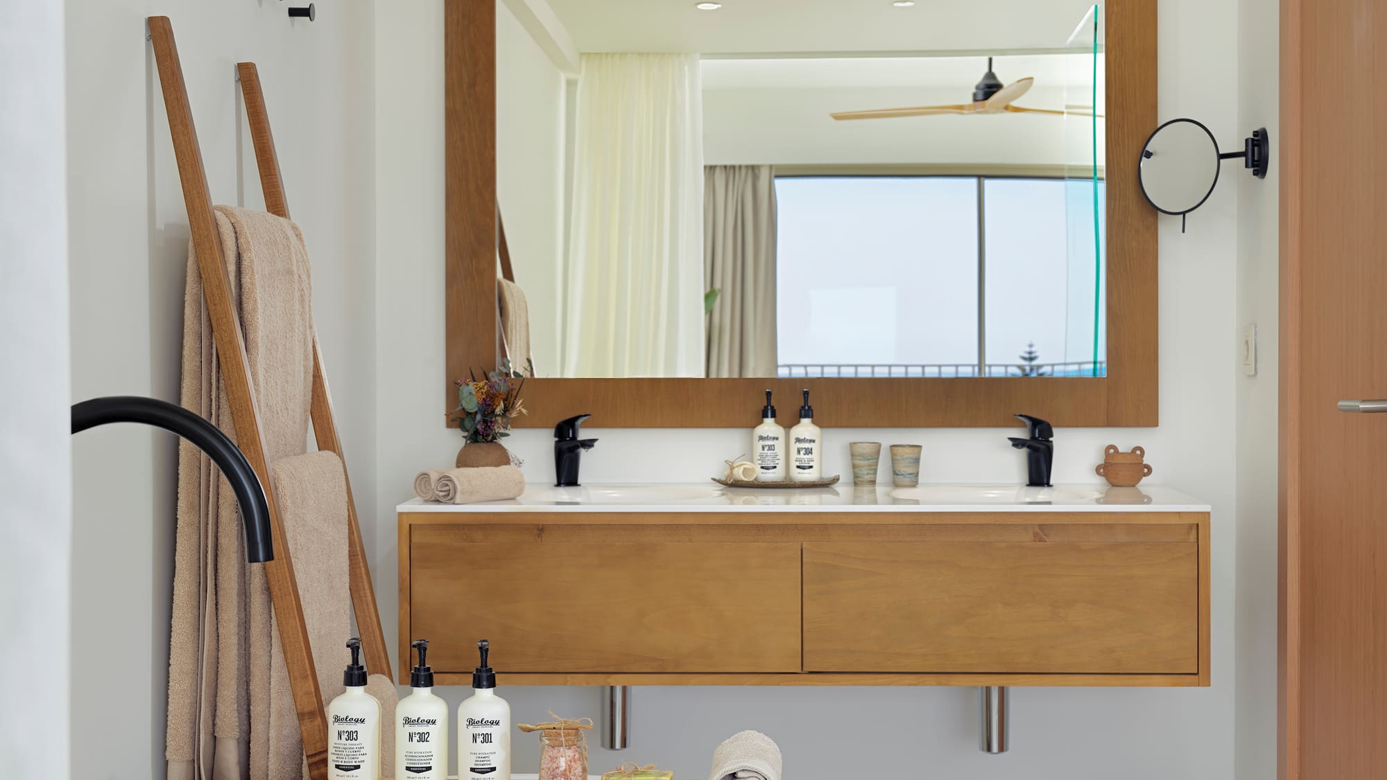 a bathroom with a bathtub and a mirror