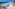 a beach with umbrellas and chairs
