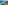 a beach with buildings and trees