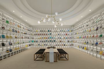 a room with a table and chairs