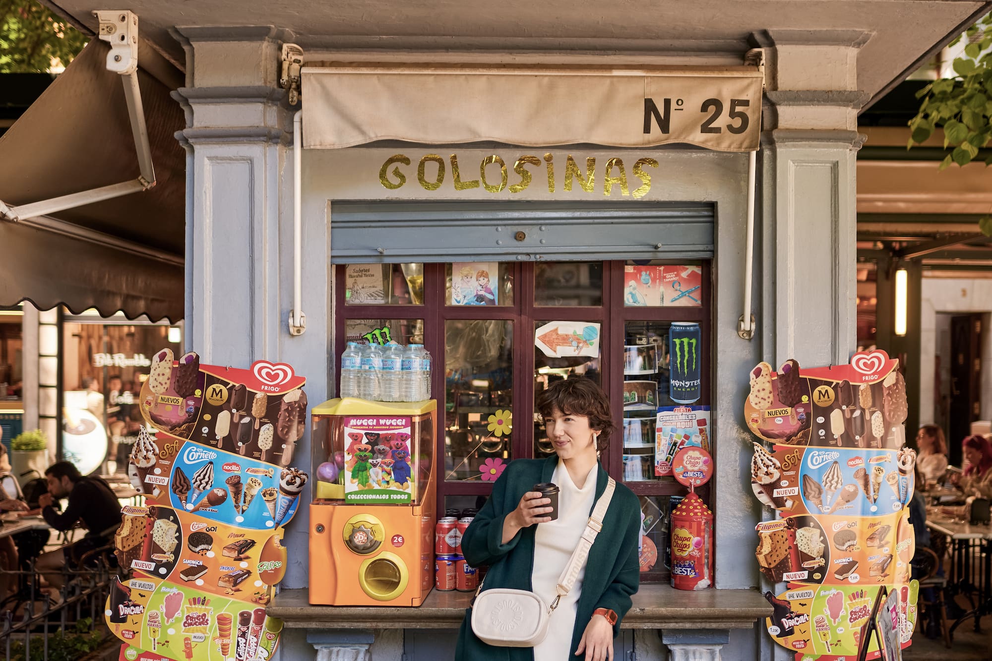 a woman standing in front of a small store