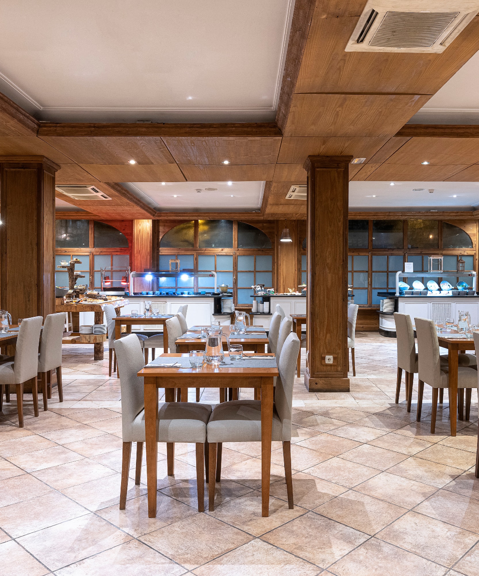 a room with tables and chairs