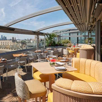 a restaurant with tables and chairs
