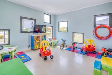 a room with toys and a tv