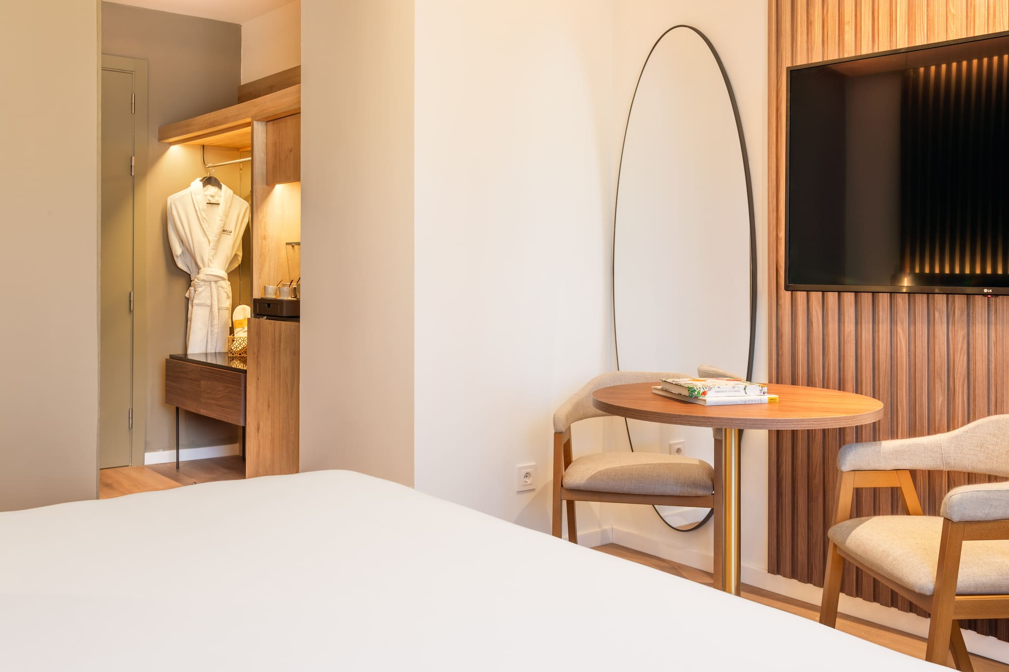 a room with a mirror and a table